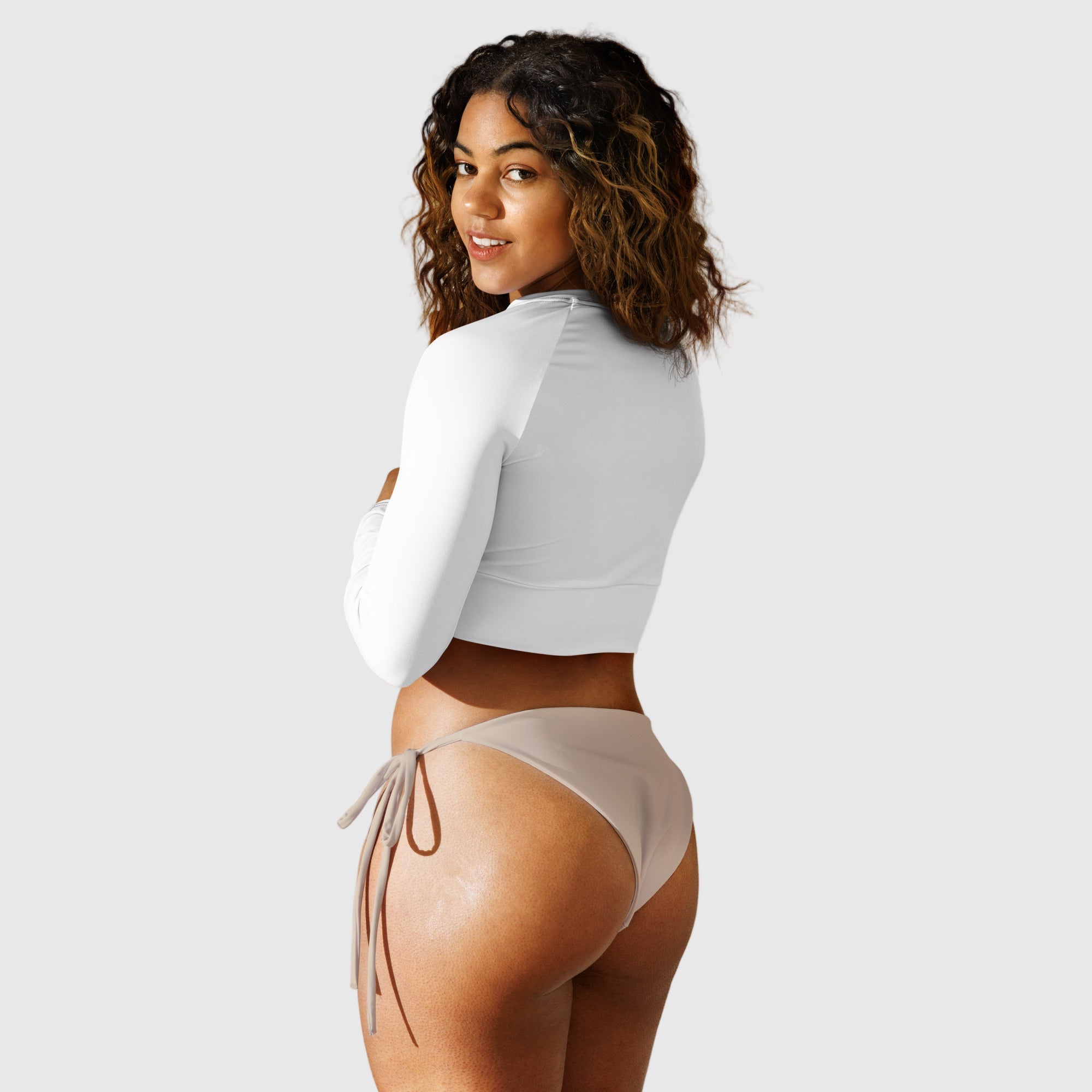 Active Aegis Recycled Long-Sleeve Crop Top in sleek compression fit made from recycled materials — lightweight, breathable, and perfect for sustainable training or casual wear.