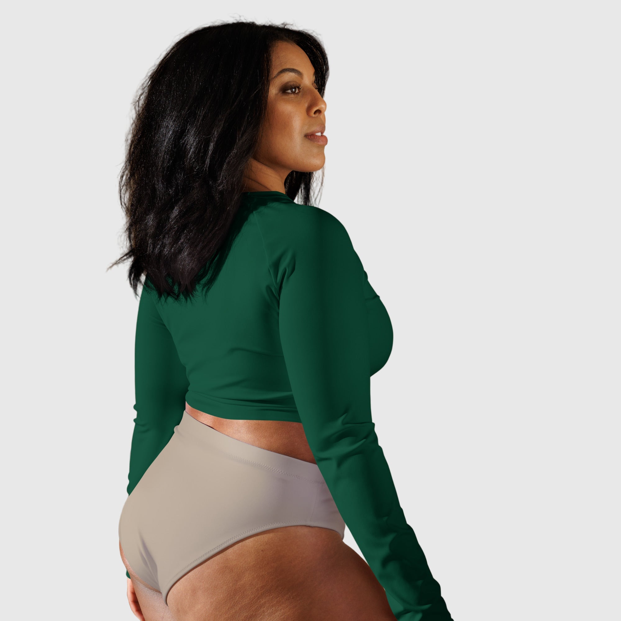 Active Aegis Recycled Long-Sleeve Crop Top in black, made from recycled polyester with sleek, breathable compression fit — ideal for gym, yoga, and sustainable everyday wear.