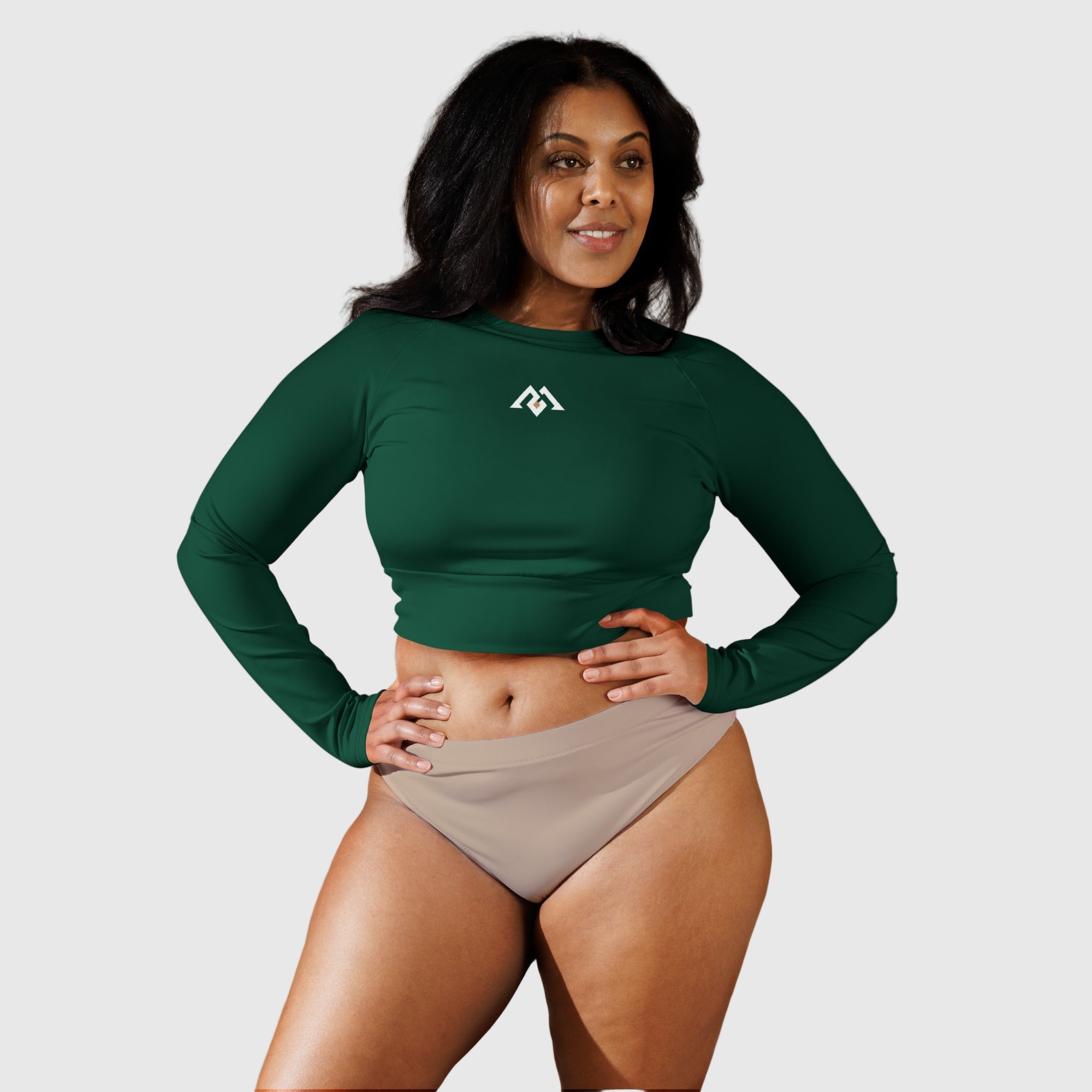Active Aegis Recycled Long-Sleeve Crop Top in black, made from recycled polyester with sleek, breathable compression fit — ideal for gym, yoga, and sustainable everyday wear.