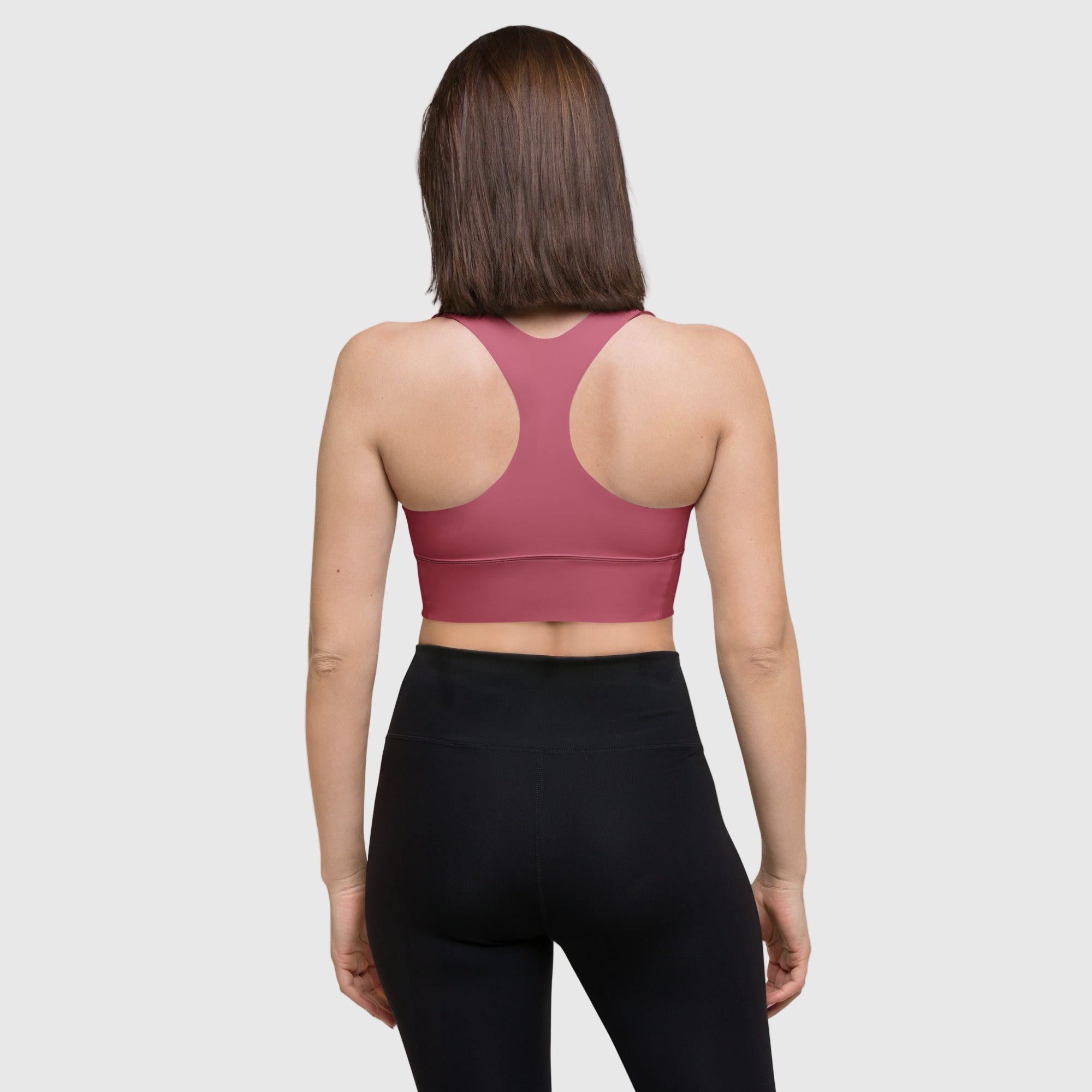 ActiveAegis Recycled Longline Sports Bra in magenta — sustainable women’s activewear with longline cut, removable padding, and breathable mesh lining for vibrant, supportive, and eco-conscious performance.