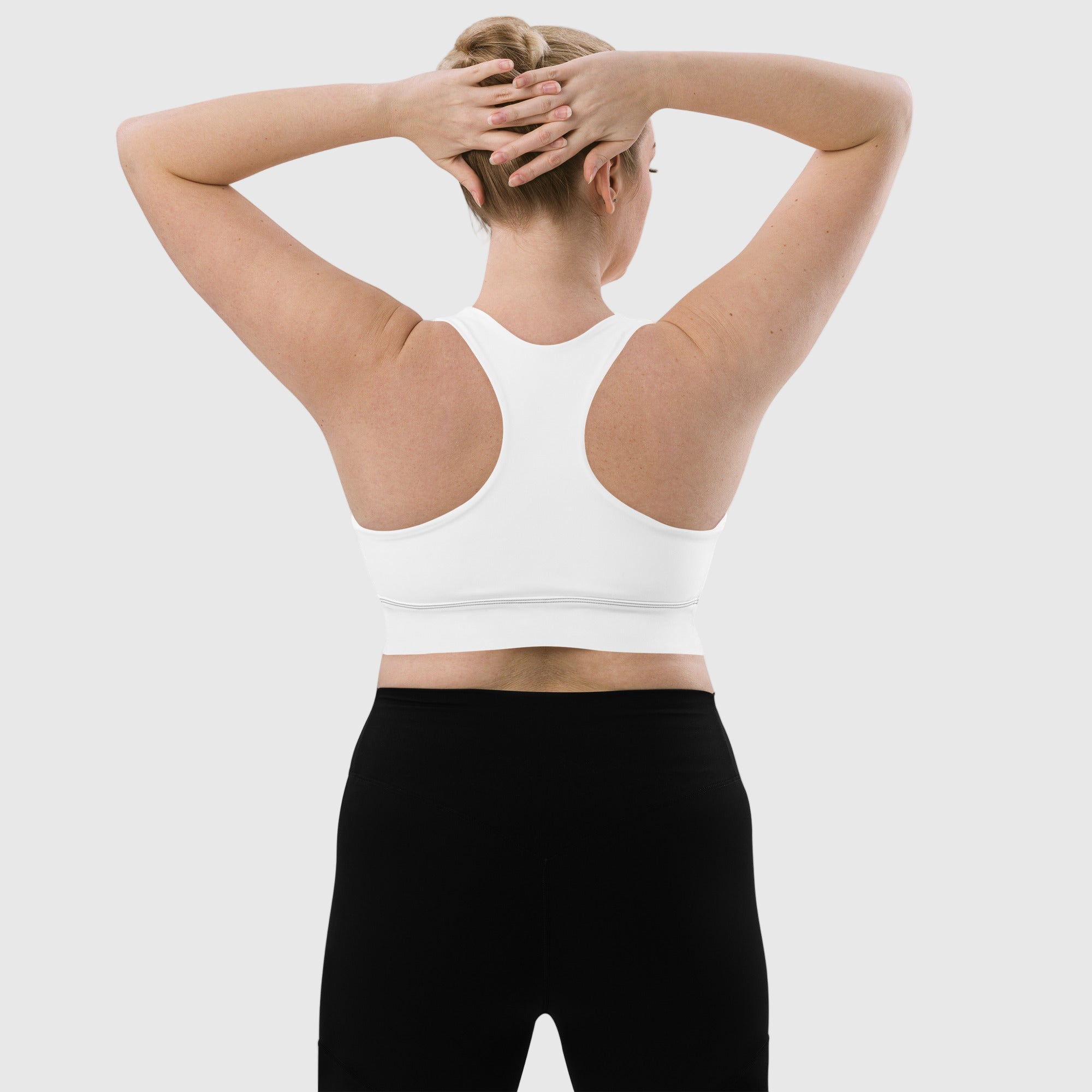ActiveAegis Recycled Longline Sports Bra in minimalist white — sustainable, sleek women’s activewear with longline cut, removable padding, and breathable mesh lining for eco-conscious, high-performance support.