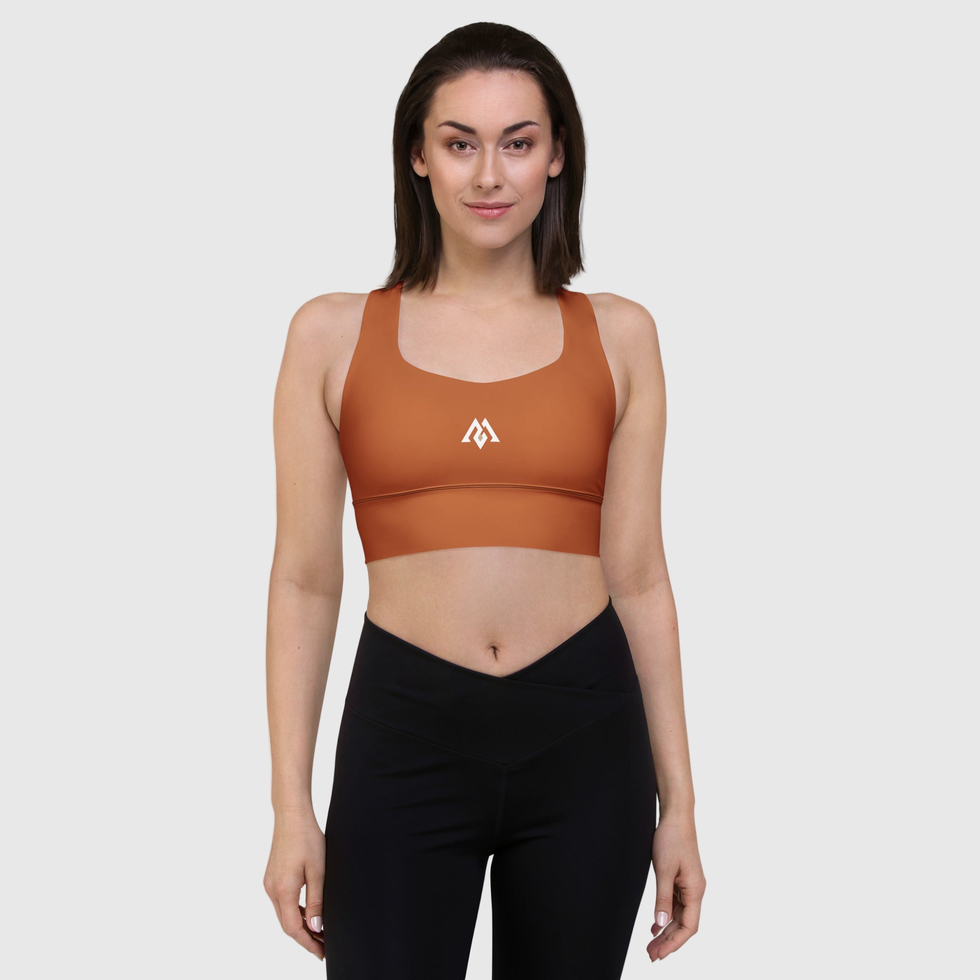 Brown recycled longline sports bra by ActiveAegis – eco-friendly, supportive, and breathable women’s activewear for fitness, yoga, and gym training.
