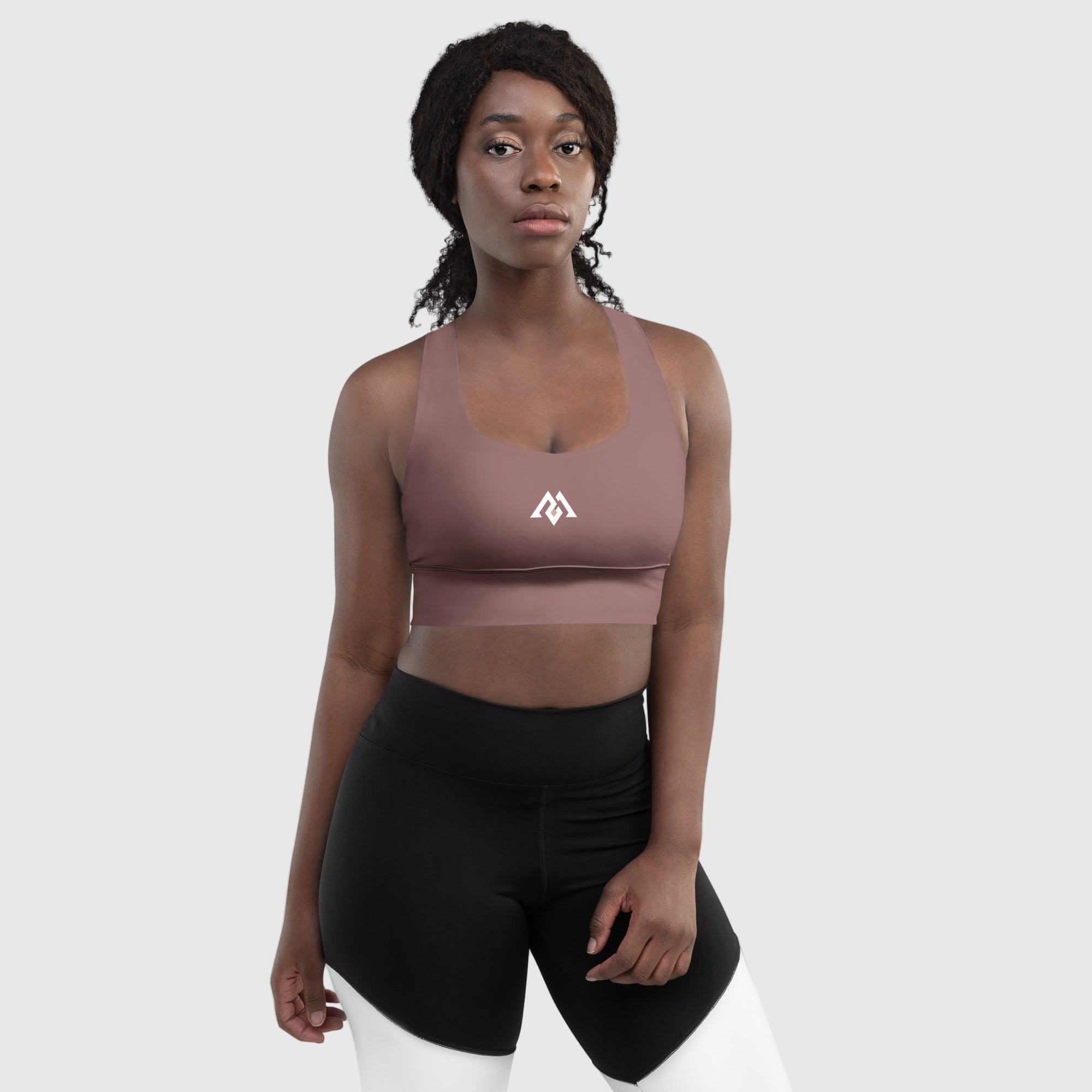ActiveAegis Recycled Longline Sports Bra in dark brown — sustainable women’s activewear featuring longline fit, removable padding, and breathable mesh lining for comfort, support, and eco-conscious performance.