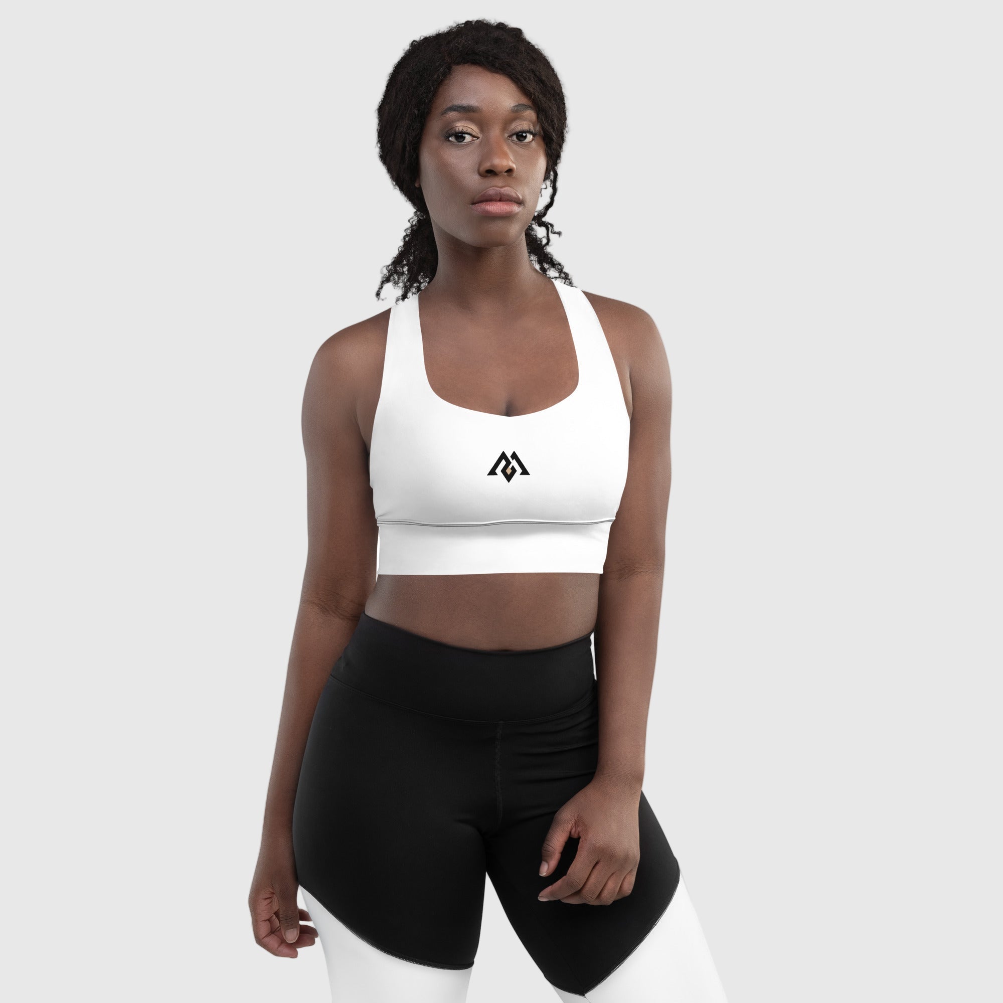 ActiveAegis Recycled Longline Sports Bra in white — sustainable women’s activewear with a longline fit, removable padding, and breathable mesh lining for a sleek, supportive, and eco-conscious gym look.