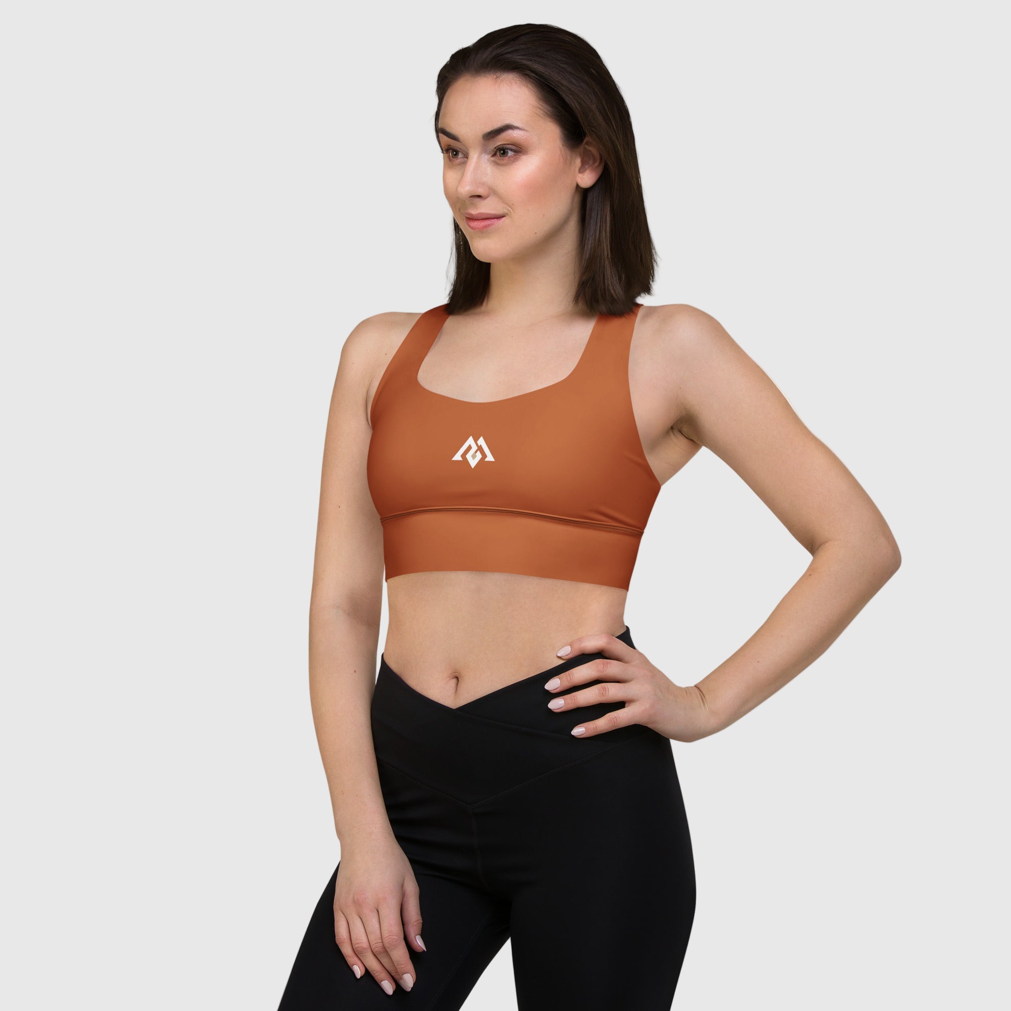 Brown recycled longline sports bra by ActiveAegis – eco-friendly, supportive, and breathable women’s activewear for fitness, yoga, and gym training.