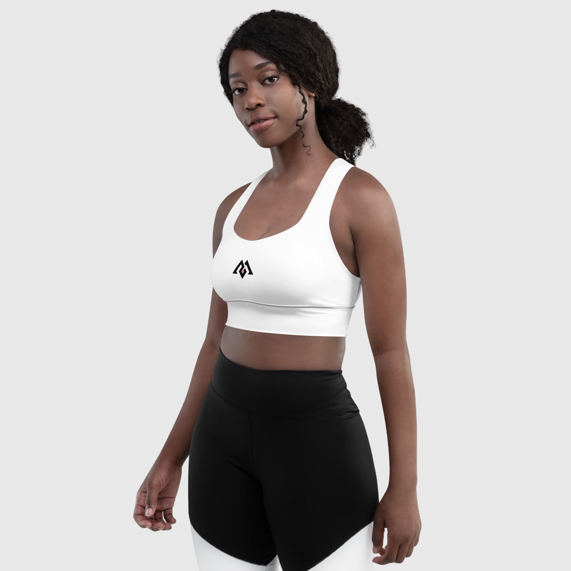ActiveAegis Recycled Longline Sports Bra in white — sustainable women’s activewear with a longline fit, removable padding, and breathable mesh lining for a sleek, supportive, and eco-conscious gym look.
