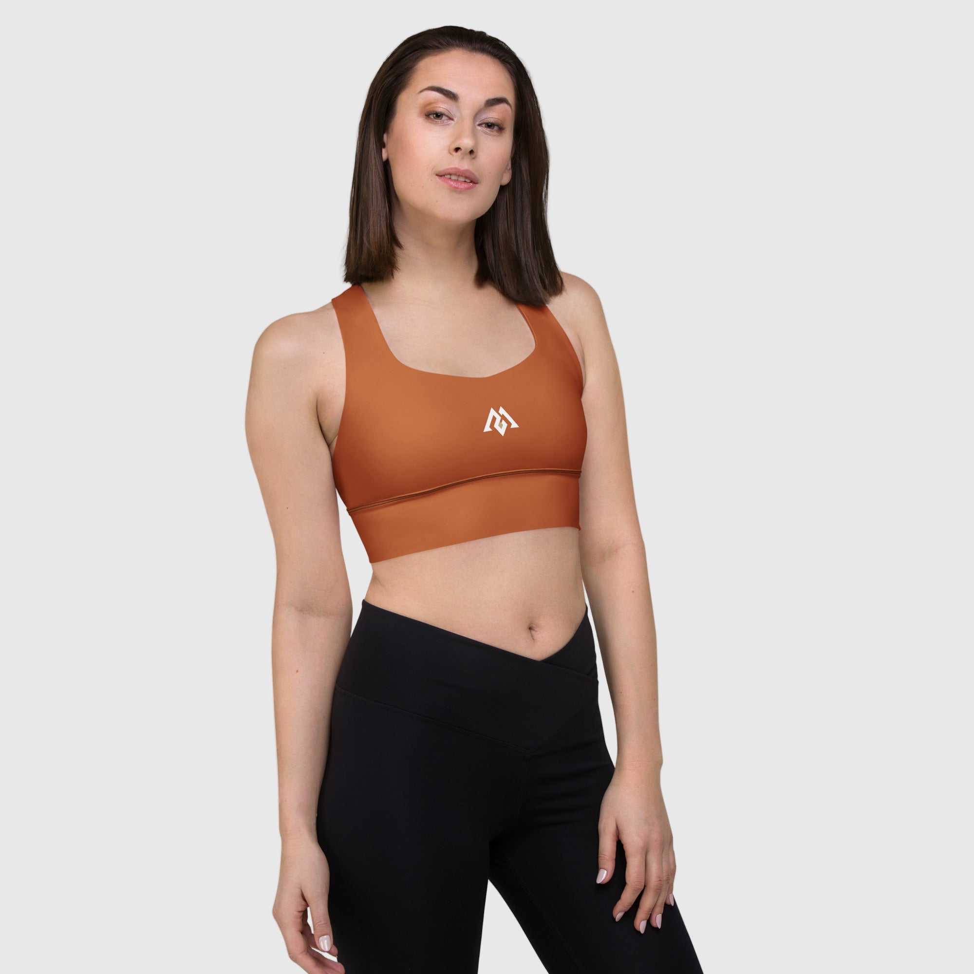 Brown recycled longline sports bra by ActiveAegis – eco-friendly, supportive, and breathable women’s activewear for fitness, yoga, and gym training.