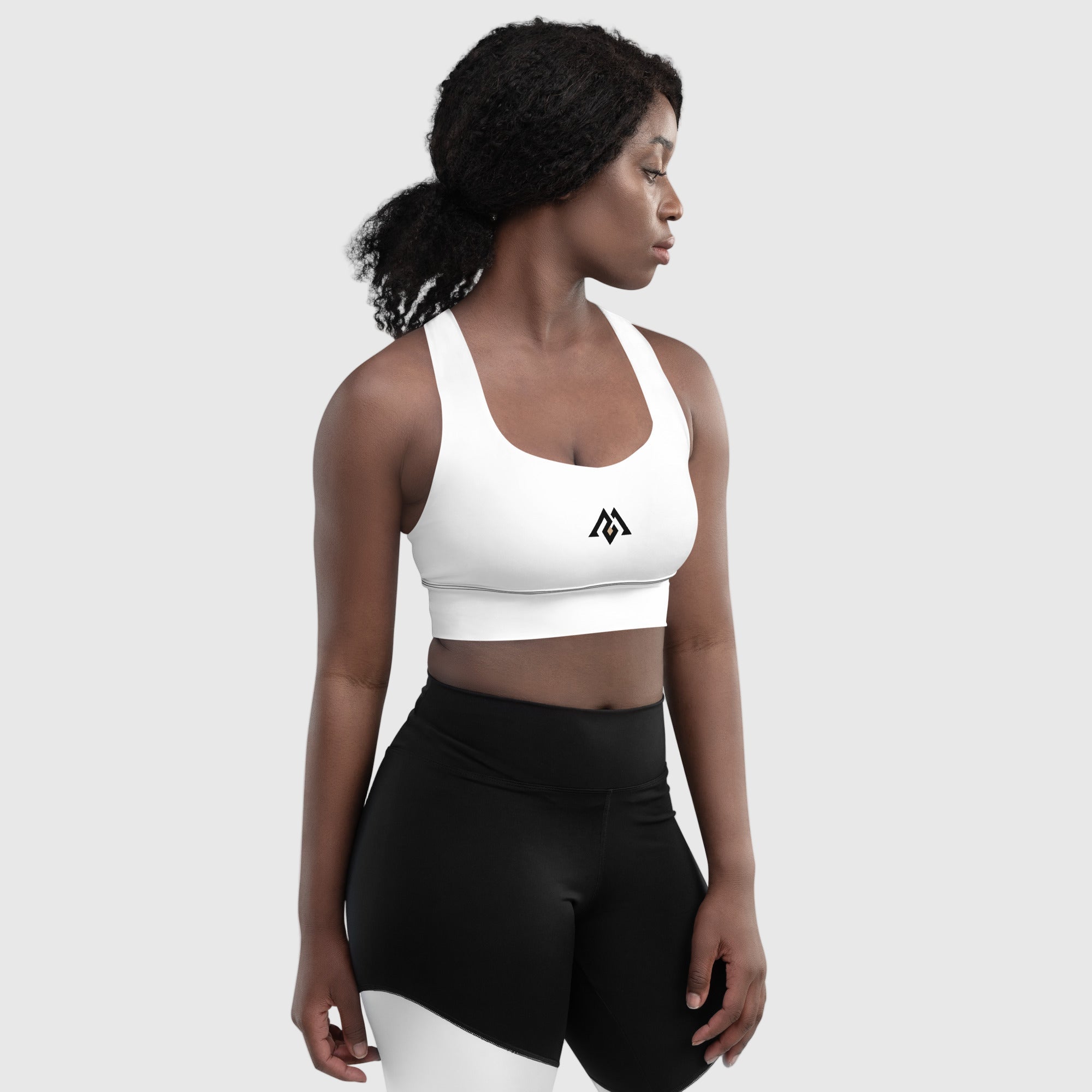 ActiveAegis Recycled Longline Sports Bra in white — sustainable women’s activewear with a longline fit, removable padding, and breathable mesh lining for a sleek, supportive, and eco-conscious gym look.