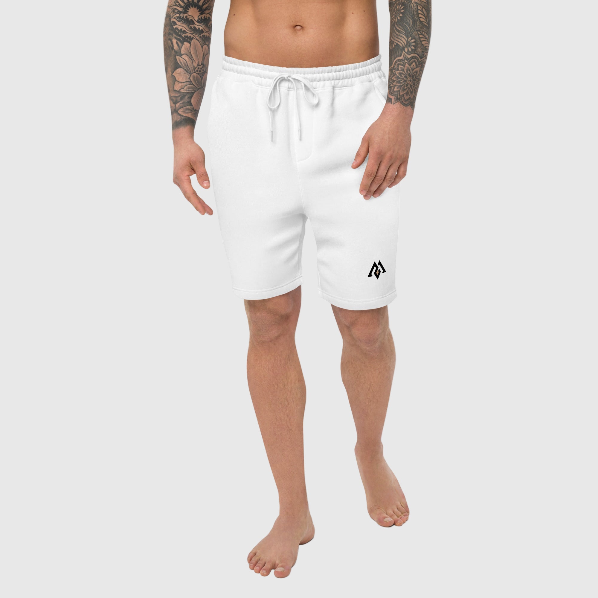 Person wearing white shorts with a logo on a white background