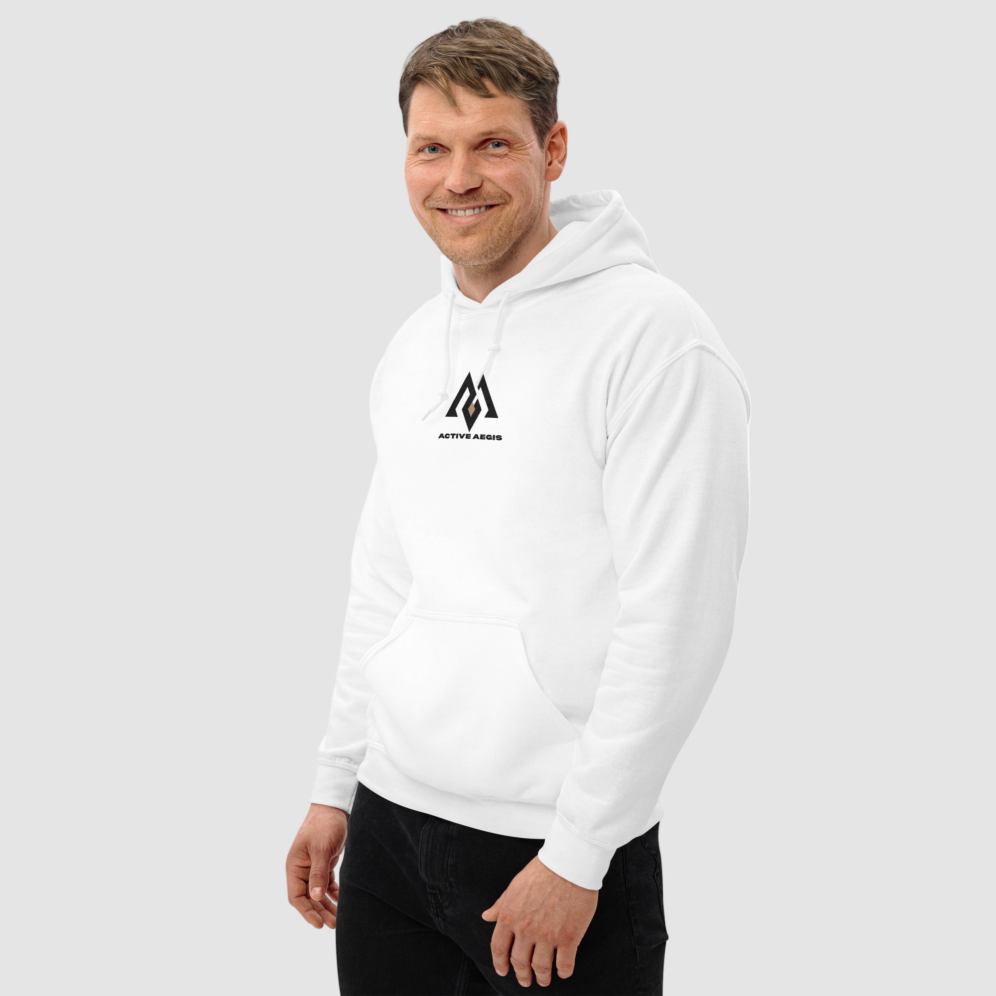 Man wearing a white hoodie with a logo on a white background