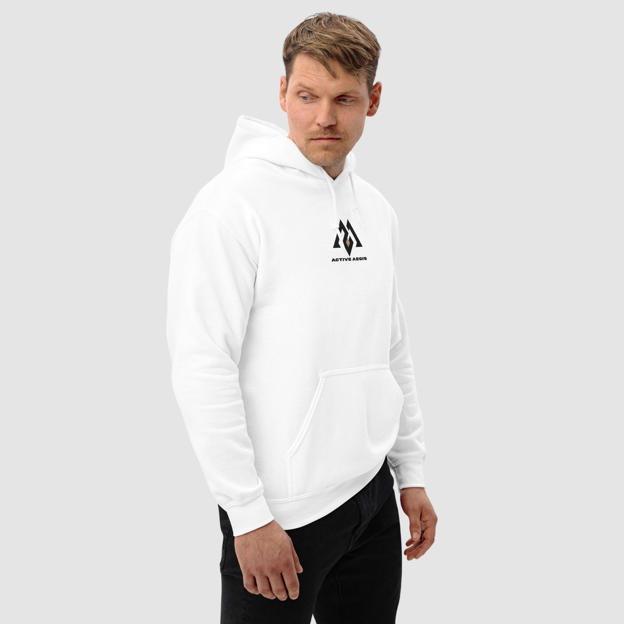 Person wearing a white hoodie with a logo on a white background