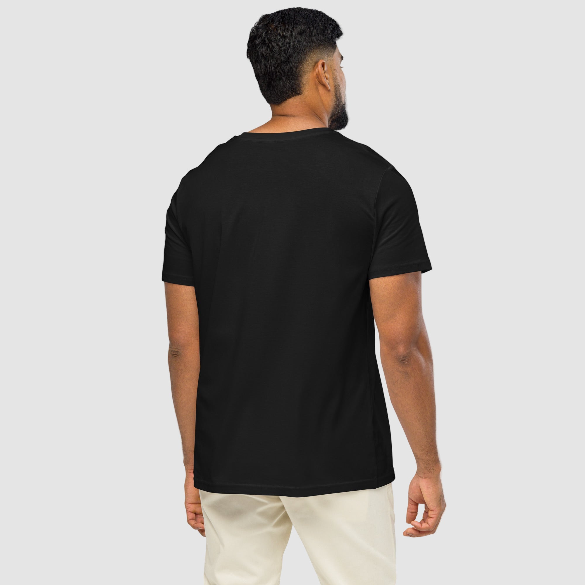 Model wearing ActiveAegis Unisex Organic Mid-Light T-Shirt in black – breathable 100% organic cotton tee designed for sustainable comfort and everyday performance.