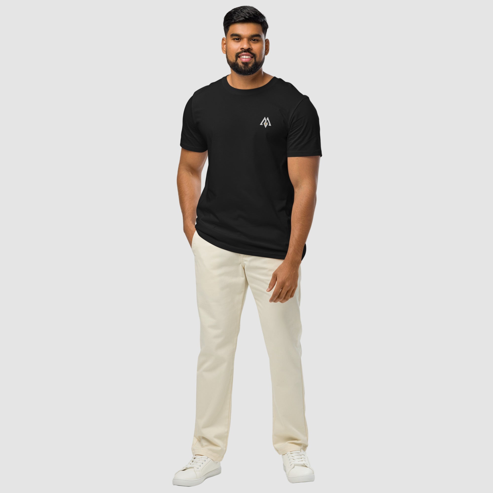 Model wearing ActiveAegis Unisex Organic Mid-Light T-Shirt in black – breathable 100% organic cotton tee designed for sustainable comfort and everyday performance.