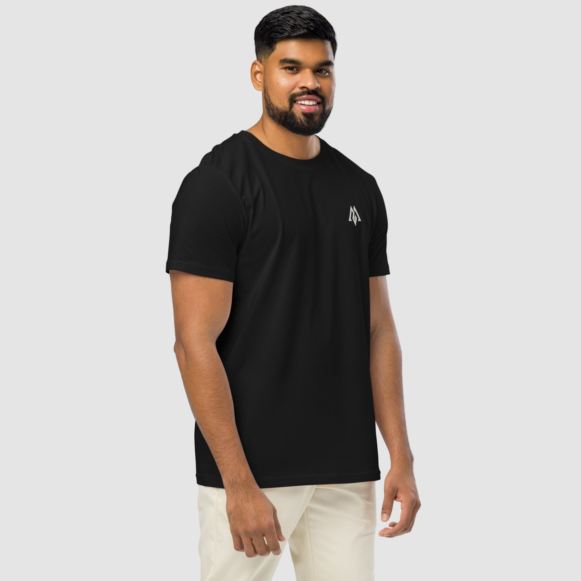 Model wearing ActiveAegis Unisex Organic Mid-Light T-Shirt in black – breathable 100% organic cotton tee designed for sustainable comfort and everyday performance.