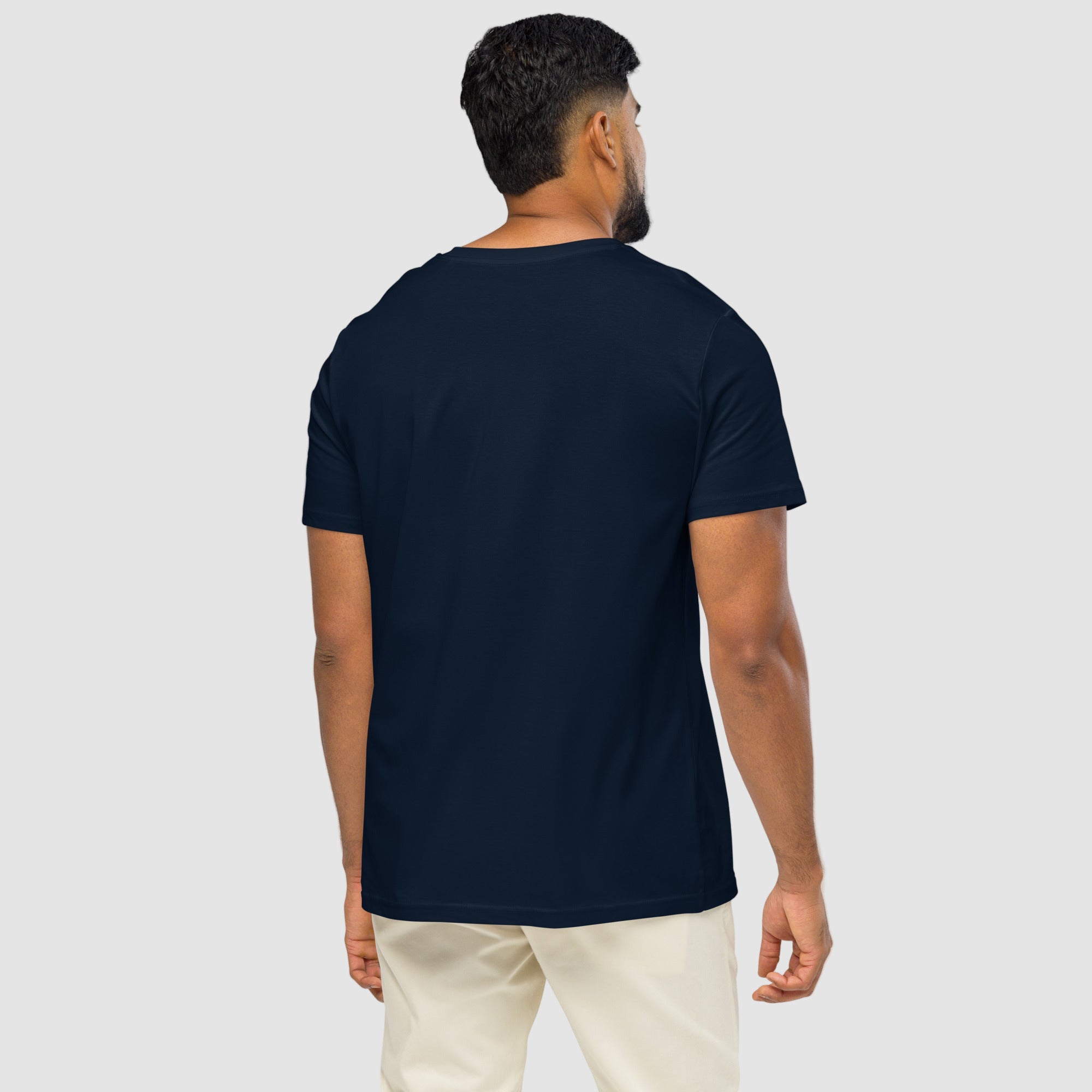 Model wearing ActiveAegis Unisex Organic Mid-Light T-Shirt in navy – breathable, 100% organic cotton tee designed for sustainable comfort and minimalist performance wear.