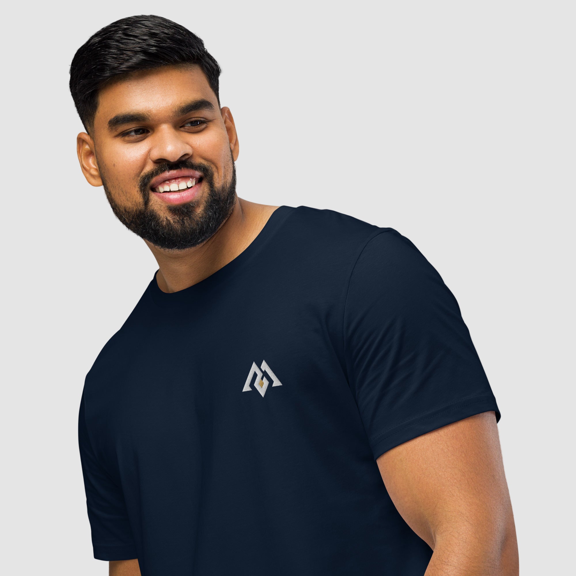 Model wearing ActiveAegis Unisex Organic Mid-Light T-Shirt in navy – breathable, 100% organic cotton tee designed for sustainable comfort and minimalist performance wear.