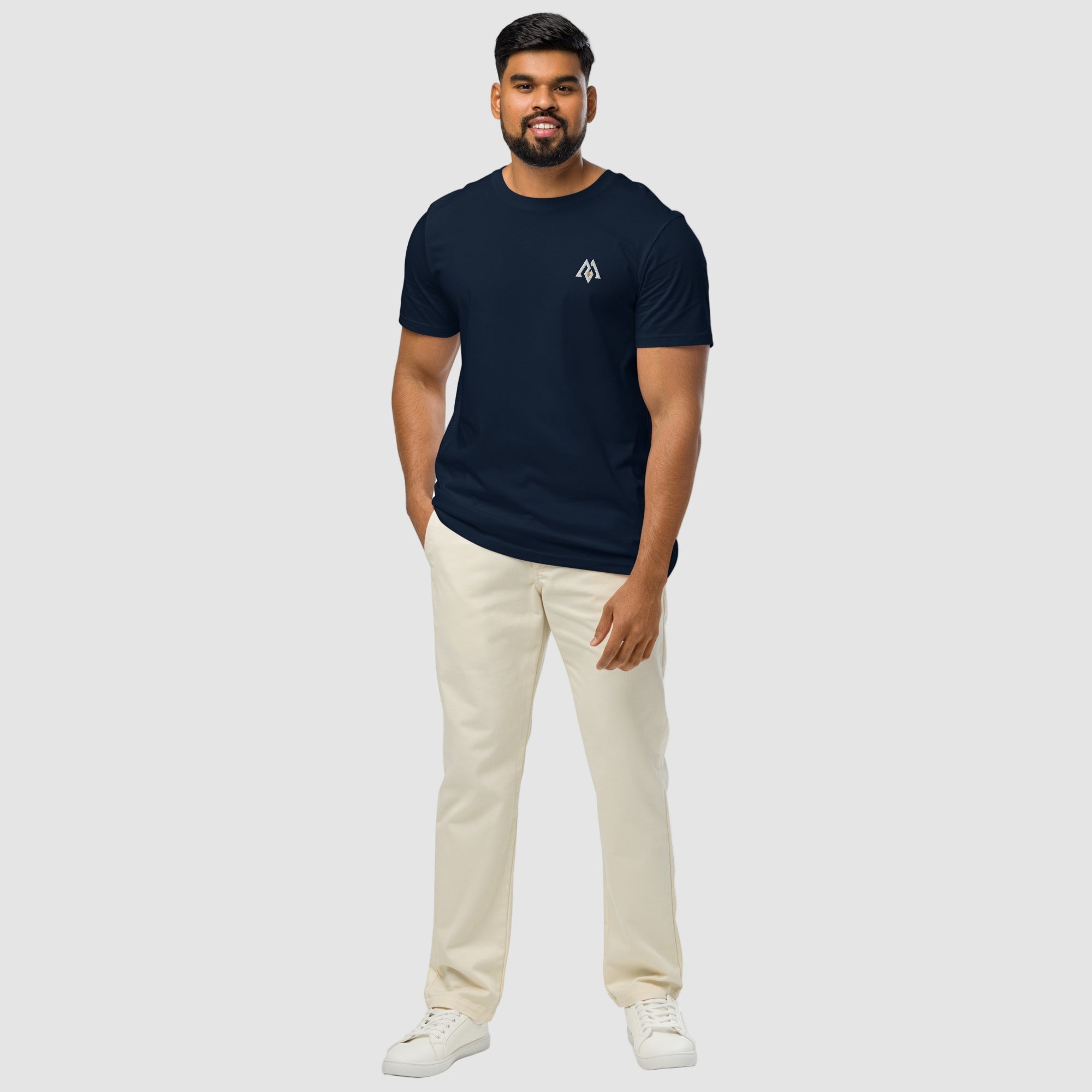 Model wearing ActiveAegis Unisex Organic Mid-Light T-Shirt in navy – breathable, 100% organic cotton tee designed for sustainable comfort and minimalist performance wear.