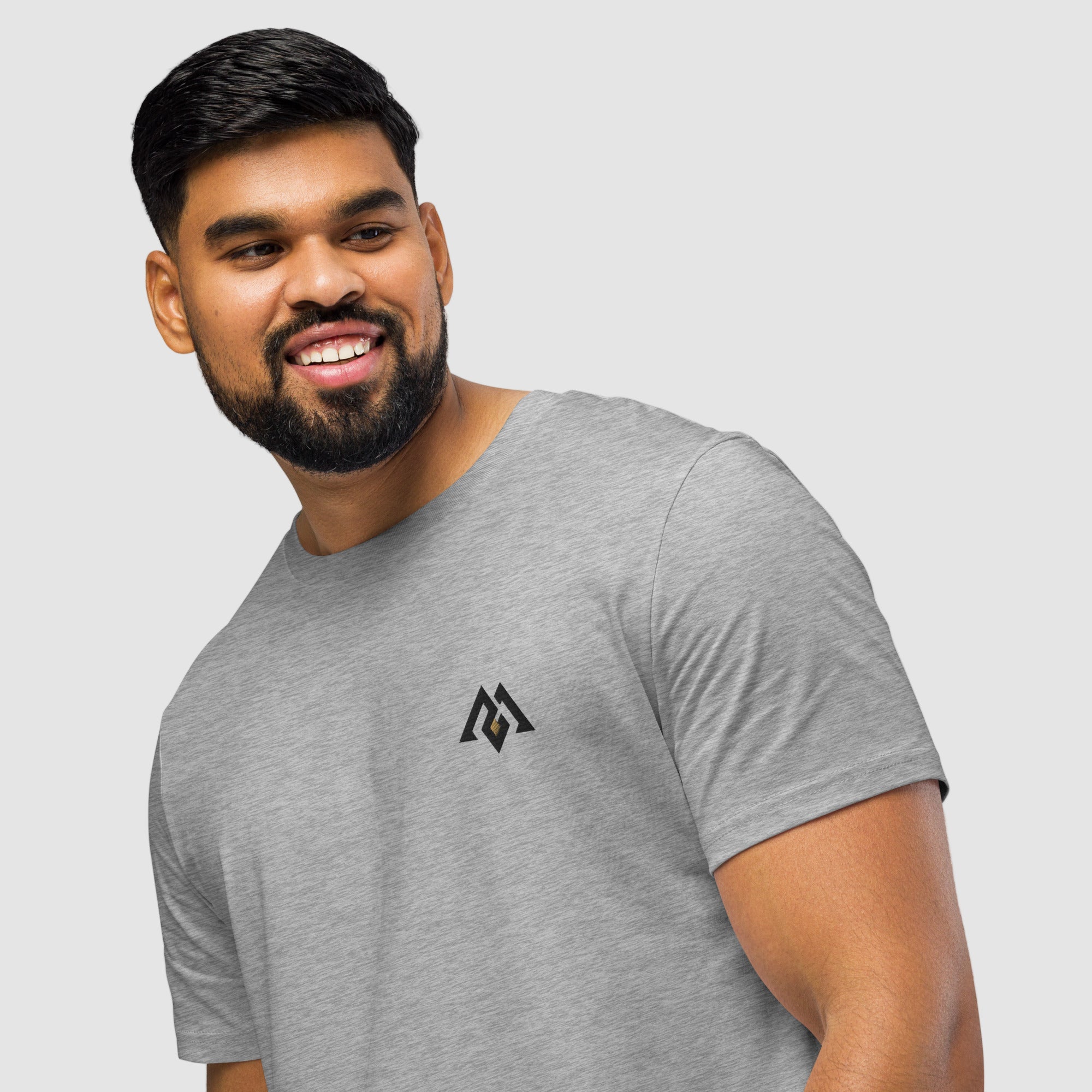 Model wearing ActiveAegis Unisex Organic Mid-Light T-Shirt in grey – breathable 100% organic cotton tee designed for comfort, sustainability, and everyday performance