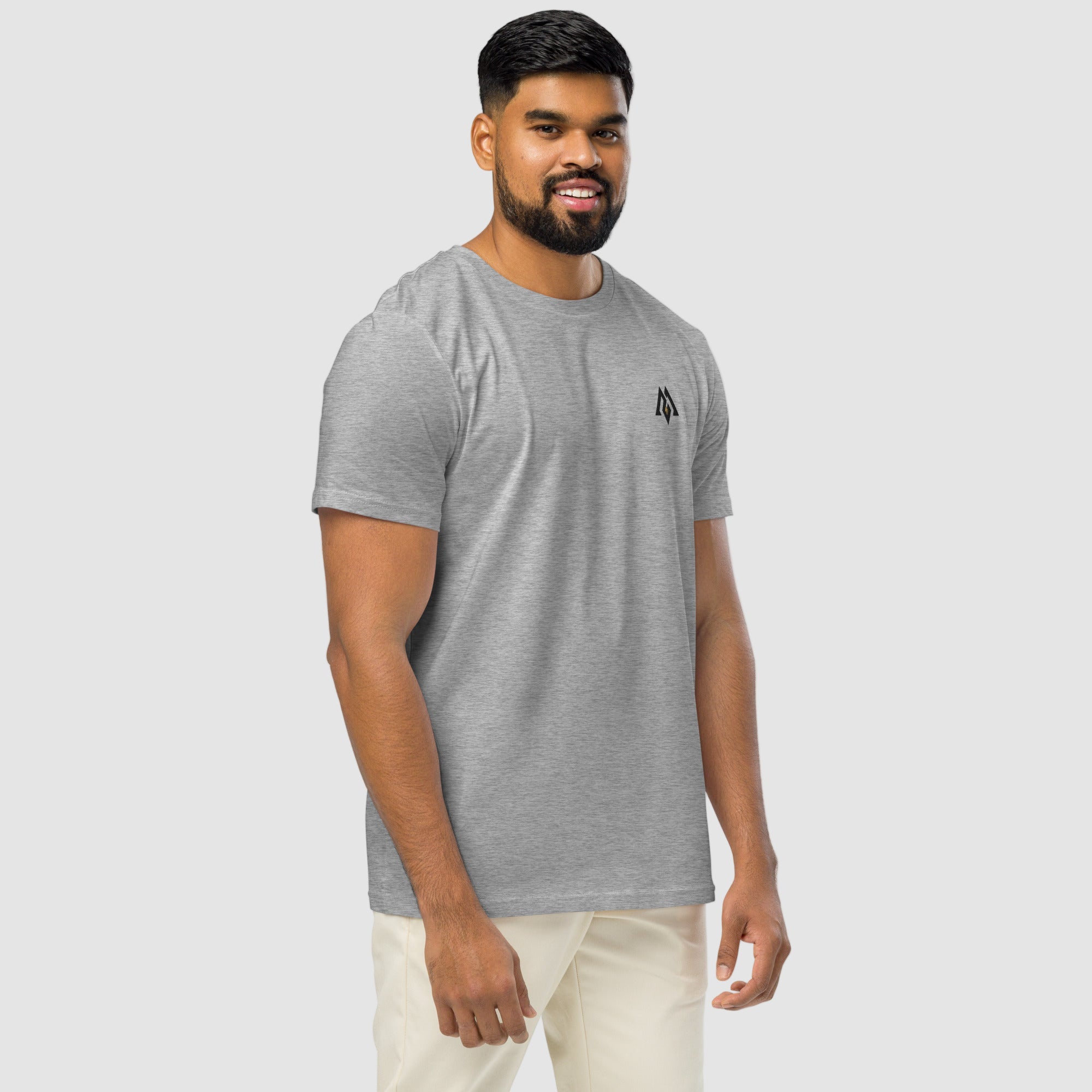 Model wearing ActiveAegis Unisex Organic Mid-Light T-Shirt in grey – breathable 100% organic cotton tee designed for comfort, sustainability, and everyday performance