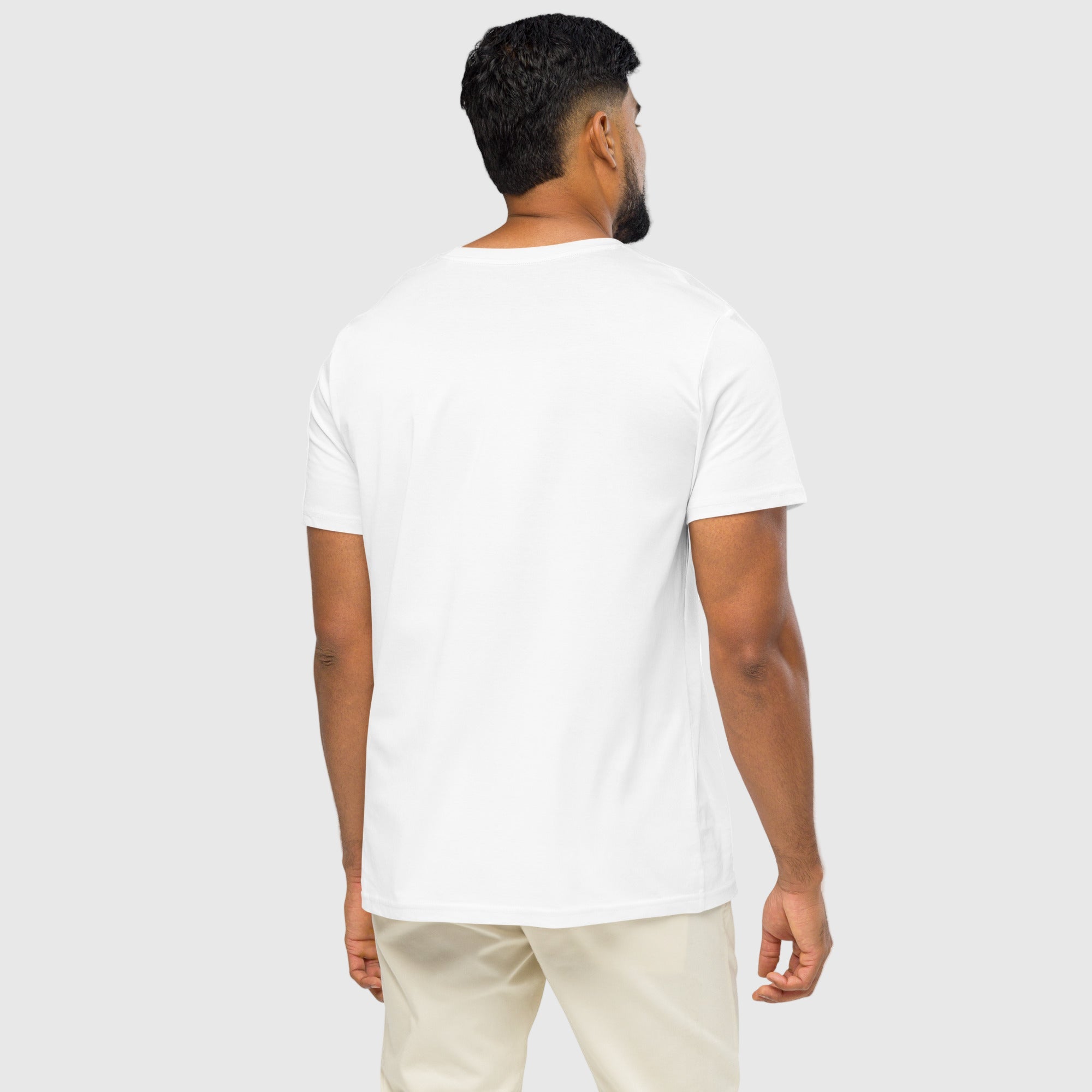 Model wearing ActiveAegis Unisex Organic Mid-Light T-Shirt in white – 100% organic cotton, breathable and sustainably made minimalist activewear.