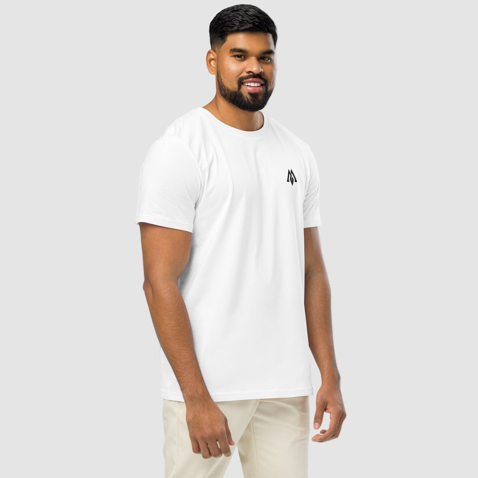 Model wearing ActiveAegis Unisex Organic Mid-Light T-Shirt in white – 100% organic cotton, breathable and sustainably made minimalist activewear.